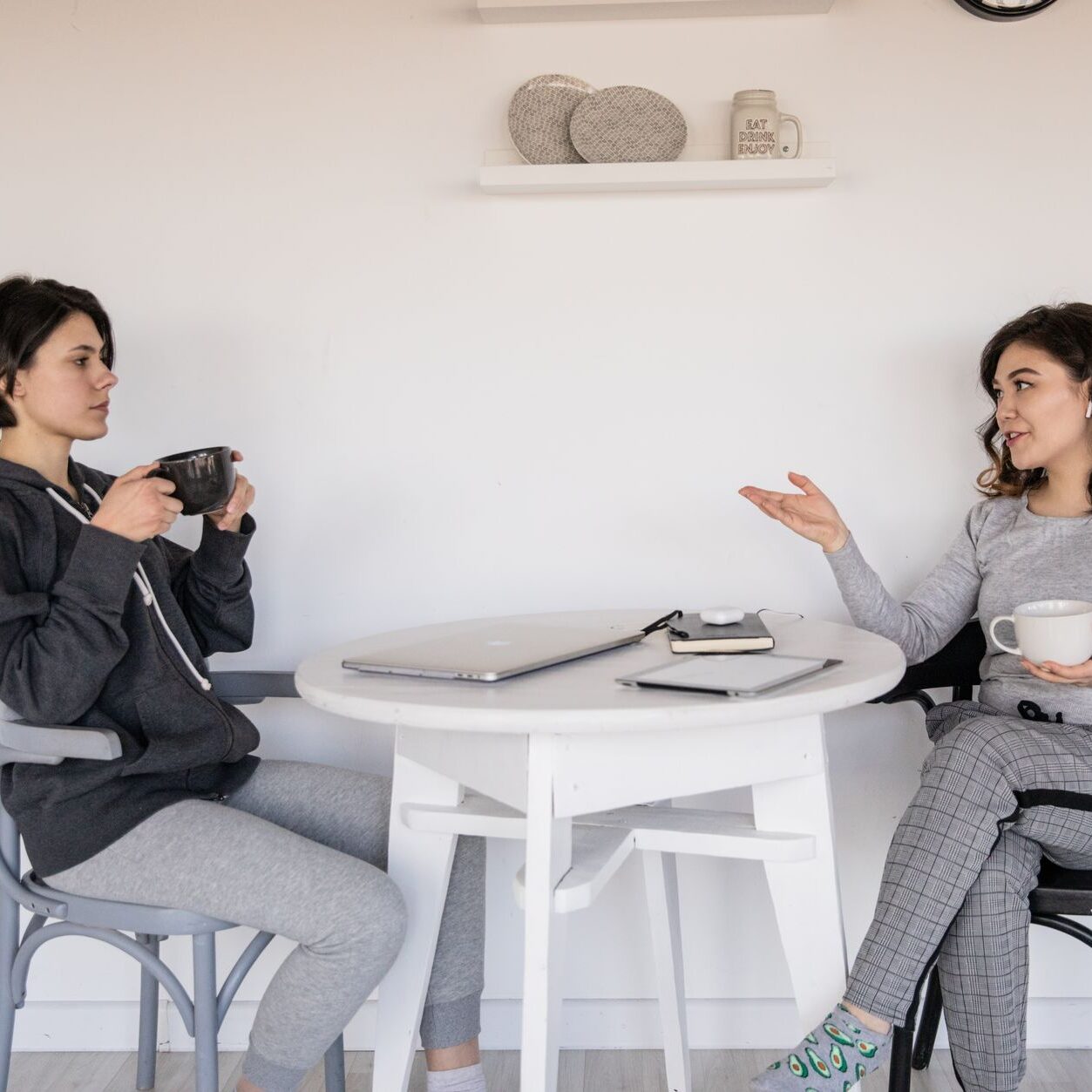 photo of women talking to each other